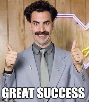 A "Great Success" reaction meme: a mustached man in a gray suit giving two thumbs up